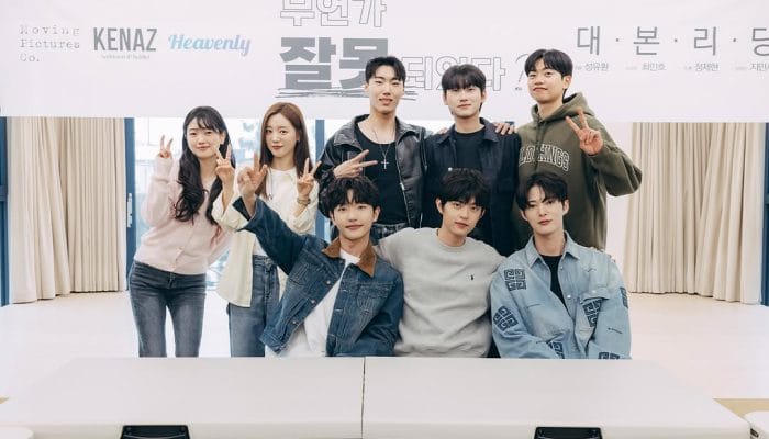 A group photo of the Something Is Not Right cast and crew during the script reading