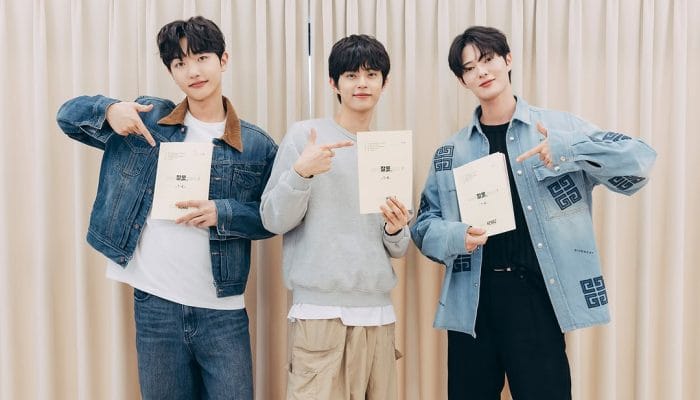 Behind-the-scenes moment of the Something Is Not Right script reading, showing the cast